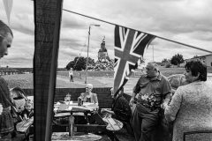 Four generations of a loyalist family against the backdrop of a bonfire structure prepared in honour of the island’s capture by the English. Belfast 2015.